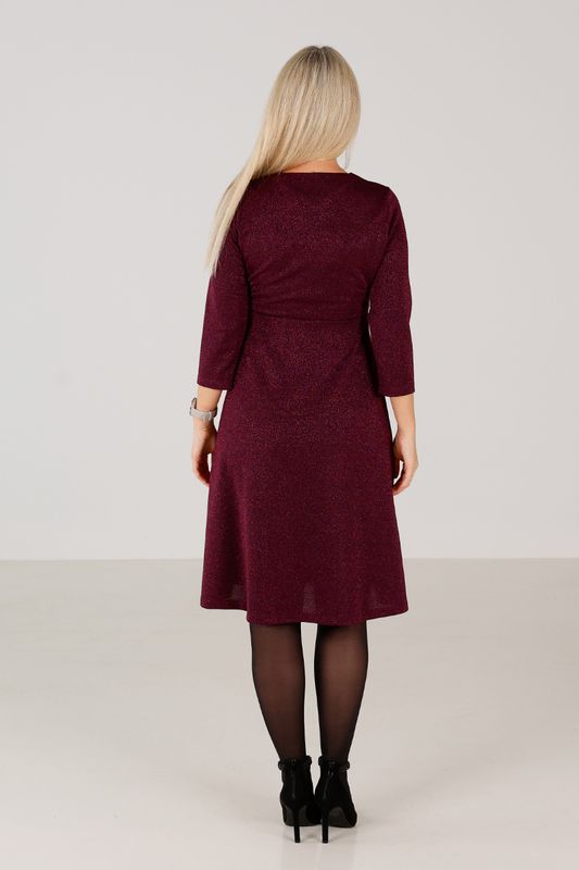 Sylvi plommonfärgad glitter klänning