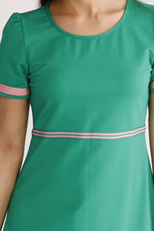 Pauline grön och rosa klänning
